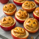 apple-jack-o-lanterns-with-peanut-butter-filling-fun-halloween-apple-snackj